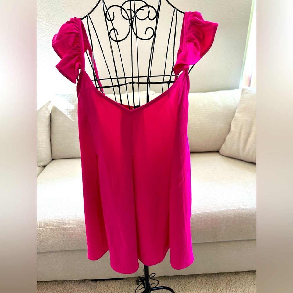 Pink sleeveless blouse